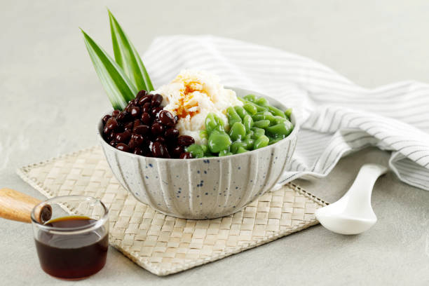 Malaysian Dessert : A Bowl of Cendol with Shredded Ice and Red Bean, Malay Popular Dessert, also Popular in Indonesia and Singapore